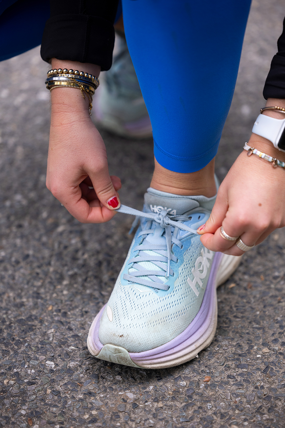 Person tying sneaker