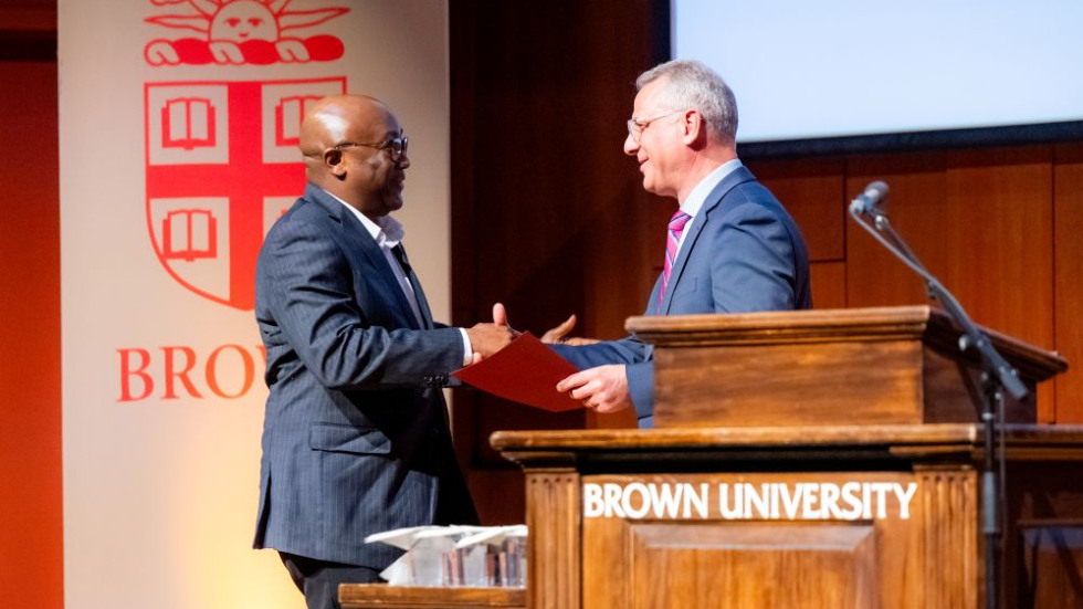 Excellence Award winner on stage