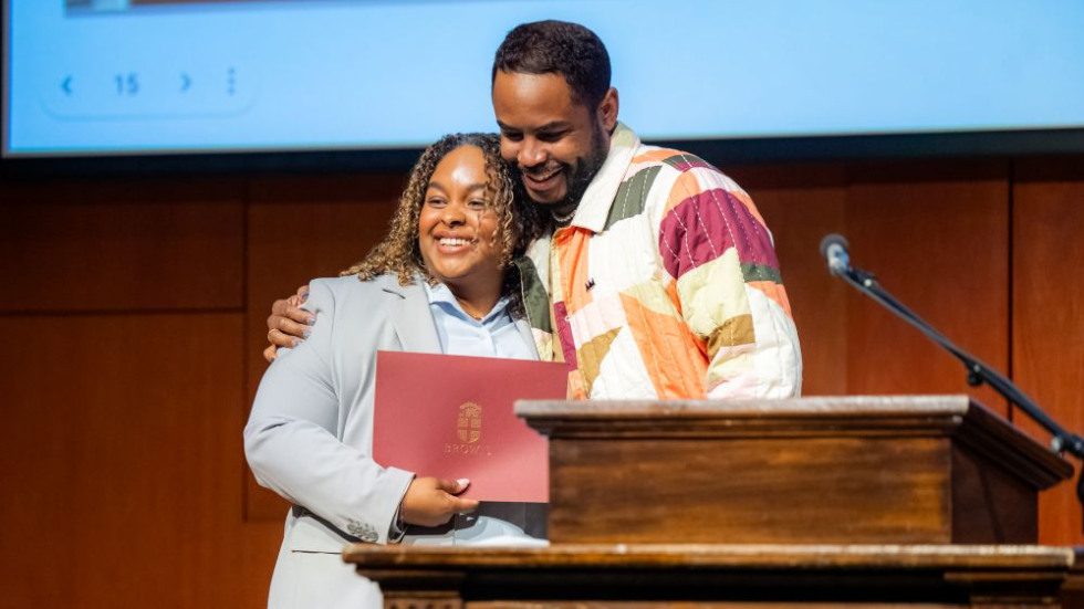 Excellence Award winner on stage