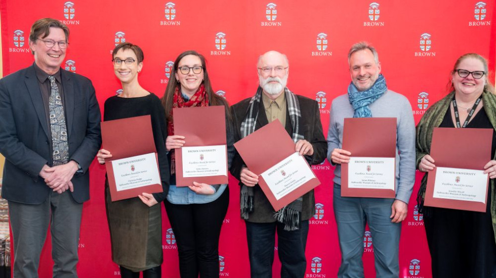 Team Excellence Award winners posing with award